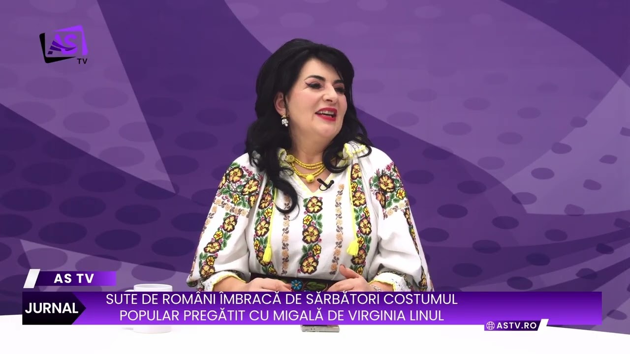 Sute de români îmbracă de Sărbători costumul popular pregătit cu migală de la Virginia Linul